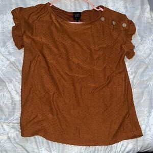 Size small rust colored blouse